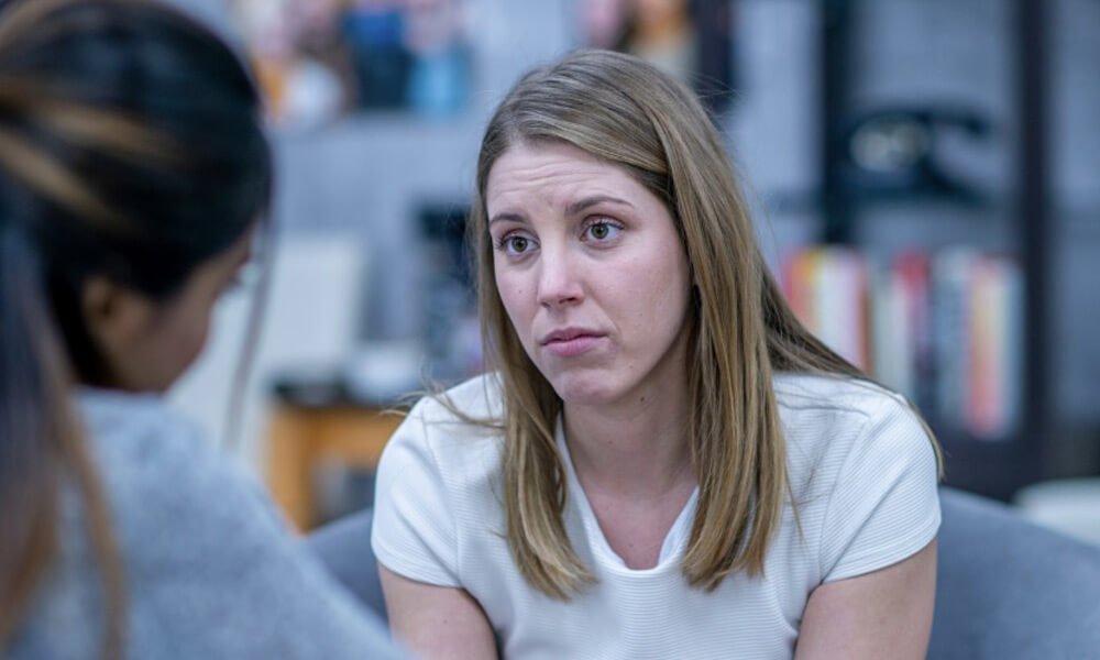 Female counsellor working with a teen